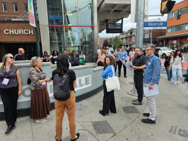 Mike Dror, MCIP RPP, Partner, had the opportunity to join Kyla Tan from Fitzrovia, Caterina Cuda from Turner Fleischer, Dan Nicholson from the City of Toronto and Benjamin Hoff from Urban Strategies Inc. on a walking tour of Bloor Crossing as part of the Mpact conference last week.
 
The master-planned community at Bloor and Dufferin was originally designed by Bousfields for Metropia and Capital Developments, and Bousfields has been working with new owners Fitzrovia and Hazelview Properties over the last few years.
 
Residents have now begun to move in, and MPACT conference attendees had the opportunity to see the ongoing work on the expansive public realm, including the new street network, mid-block connections and future public park.